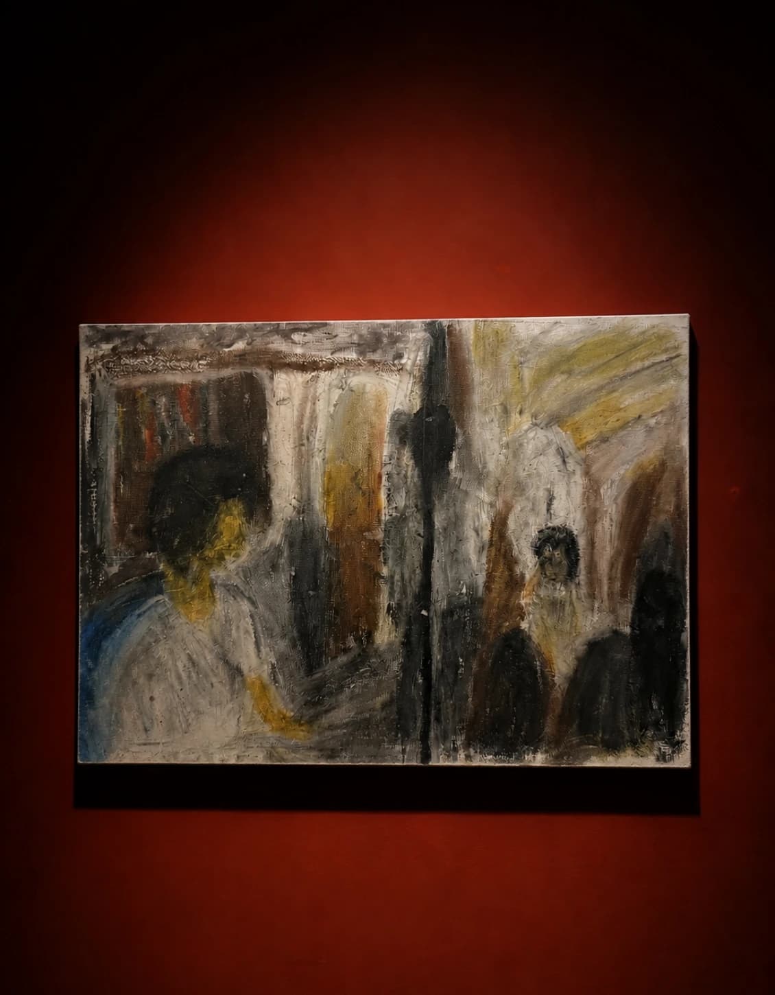 A sketch of figures and arches displayed on a red wall.