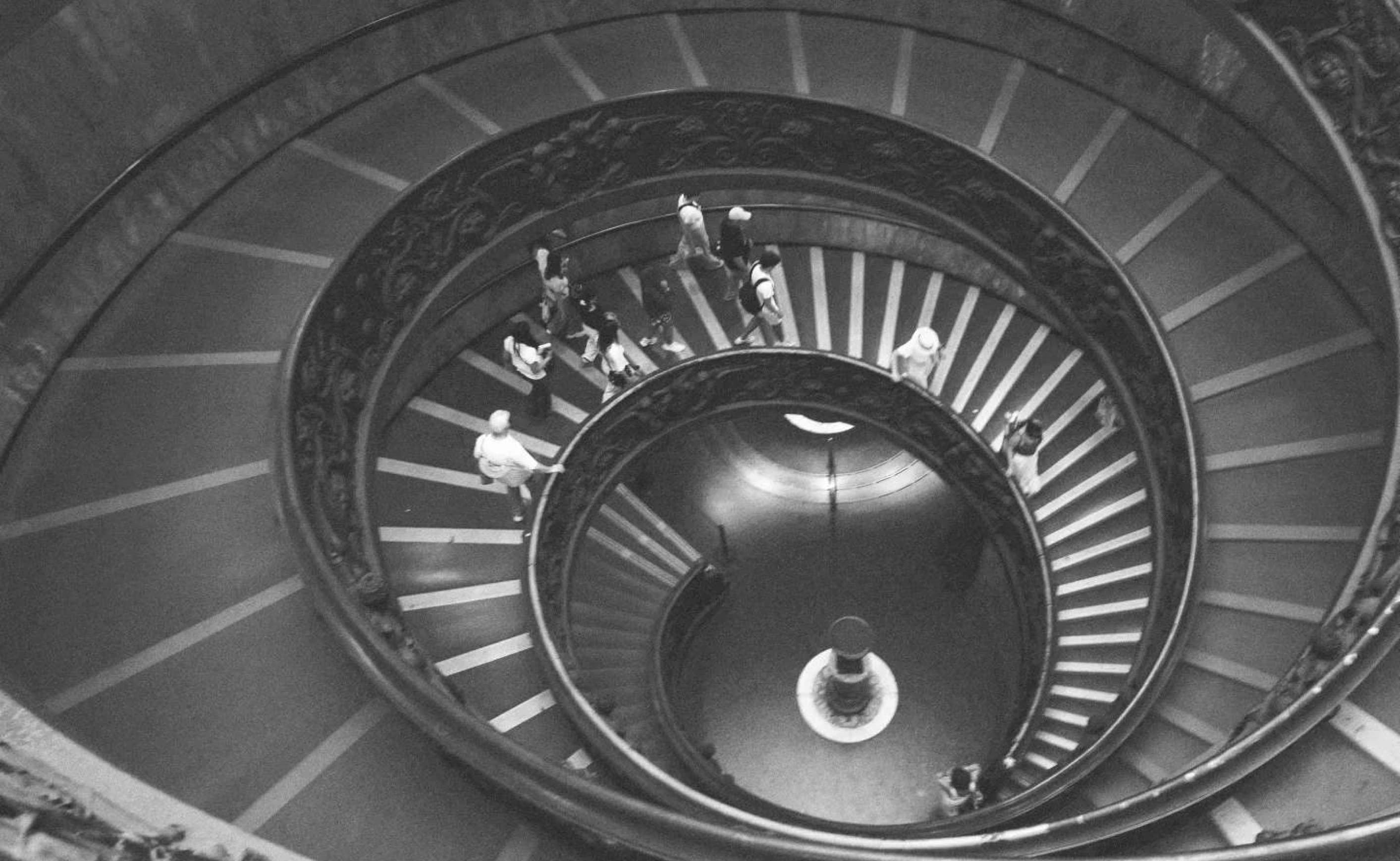 Looking down the center of a spiral staircase.
